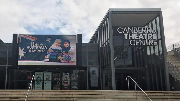 Online threats were made against the Canberra Theatre Centre digital billboard for showing an image of two Muslim children celebrating Australia Day.?