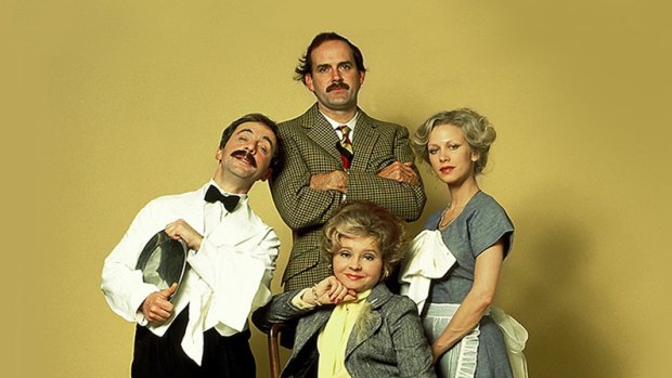 The cast of the original Fawlty Towers (left to right): Andrew Sachs as Manuel, John Cleese as Basil Fawlty, Prunella Scales as Sybil Fawlty and Connie Booth as Polly Shearman.