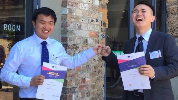 Best friends Stanley Luk and Chuyi Wang celebrate placing first in the Mathematics Extension 2 and equal first in English (Advanced) respectively.
