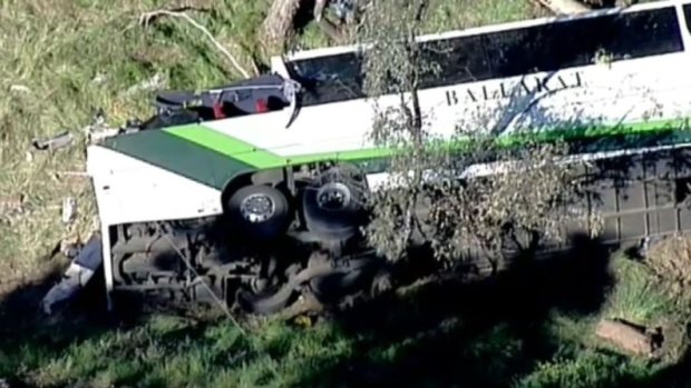 The coach rolled down an embankment after the driver lost control.