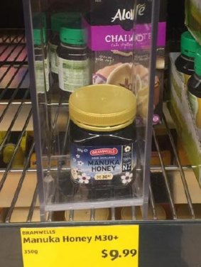 The locked-up jar of manuka honey at Aldi in Braybrook. 