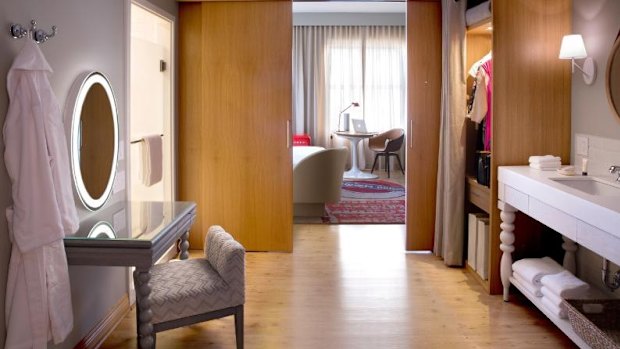 More bells and whistles: A guest suite, which is separated into two rooms with a sliding door. 