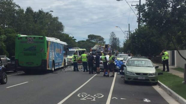 A car driver has died after a collision with a bus at Bilinga on the Gold Coast.