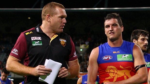 Lions coach Justin Leppitsch with skipper Tom Rockliff, who is back from injury.