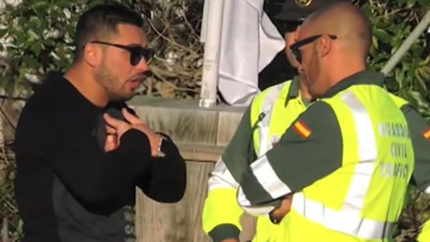 Salim Mehajer speaking to Spanish police on the island of Ibiza.