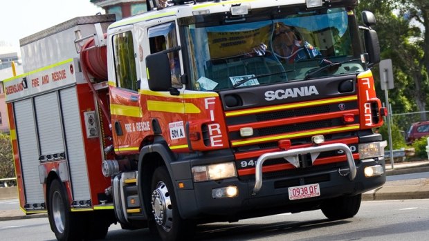 Fire crews managed to prevent a "suspicious" fire from damaging a nearby tyre business in Bowen Hills on Sunday morning. 