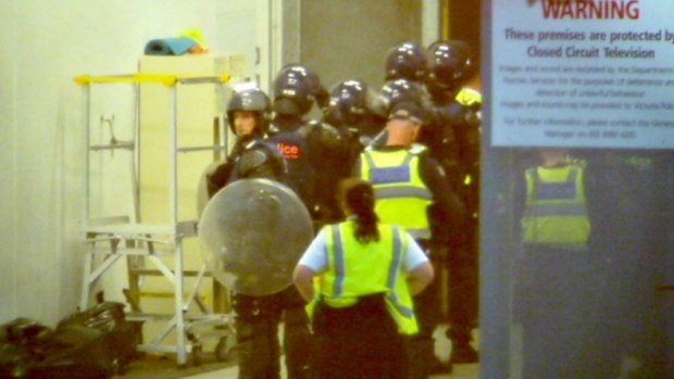 Riot police and dog handlers were called to the Parkville centre last November.