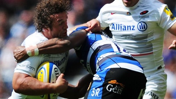 No quarter given: Jacques Burger in action for Saracens.