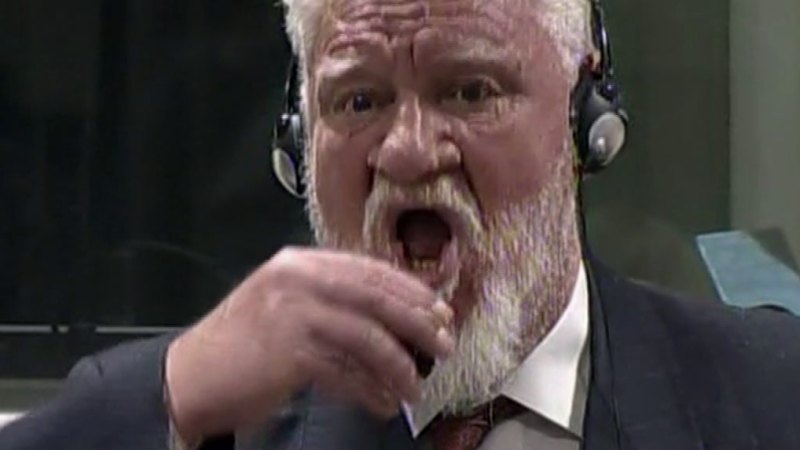 War criminal #39 drinks poison #39 in court as 20 year sentence is upheld