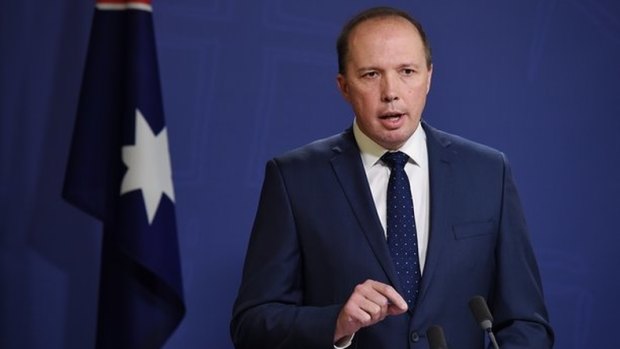 Dutton has claimed the smugglers will be "rubbing their hands" if any resettlement agreement for those on Manus and Nauru enables refugees to "come back to Australia through the back door on some tourist visa".