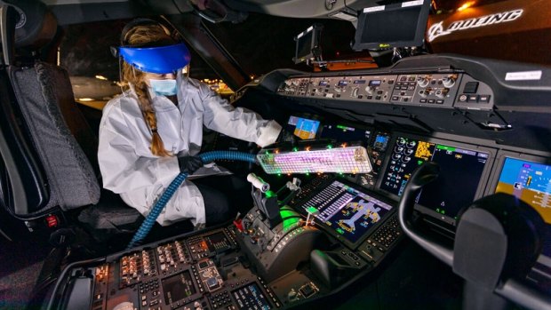 Boeing says the wand could disinfect a cockpit in 15 minutes.