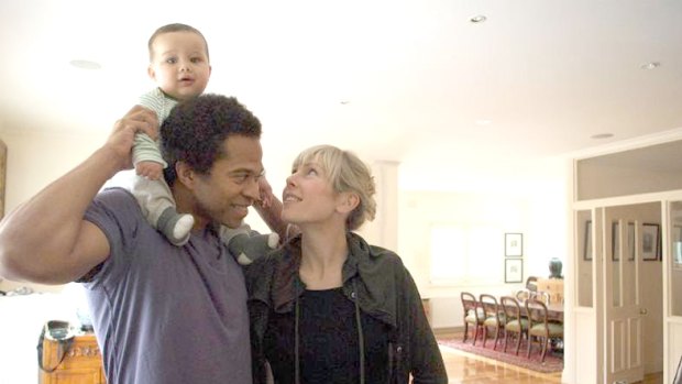 A cherubic, thriving boy: Andre and Kristine Scott with Leroy.