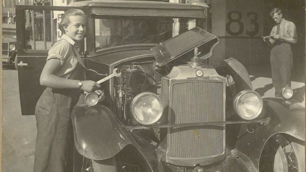 Sheila Agnes Grey (then Williamson) working as a mechanic at the Williamson's family garage on Cooma Street, Yass, aged 16.
