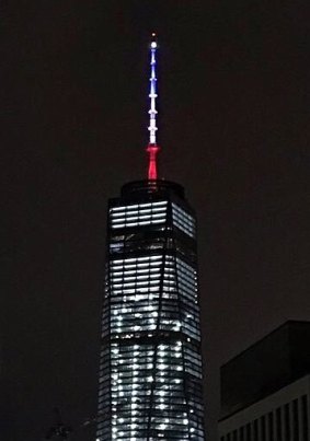 One World Trade Centre is illuminated in the colours of the French flag.