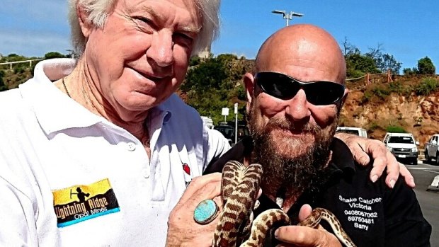 Reunited: Snake owner Nick Le Souef says he's excited to have one of three missing snakes back. Pictured with snake catcher Barry Goldsmith.