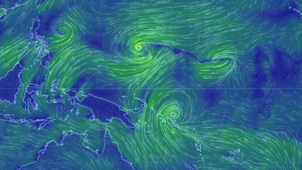 Cyclone Raquel over the Solomon Islands and the emerging Typhoon Chan-Hom.