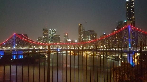 The Story Bridge lit blue, white and red in solidarity with the victims of the Paris terror attacks in November.