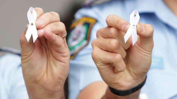 It is hard to see how simply donning a white ribbon on November 25 can significantly help women and children. 