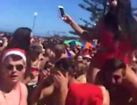 Revelers at Coogee Beach on Christmas Day.