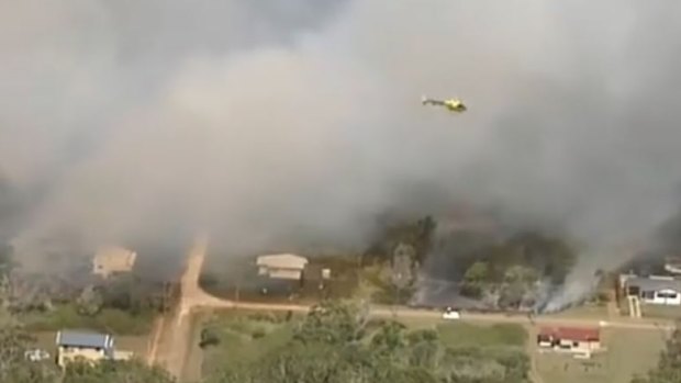 Smoke covered large areas of Russell Island on Friday as fire crews brought the blaze under control.