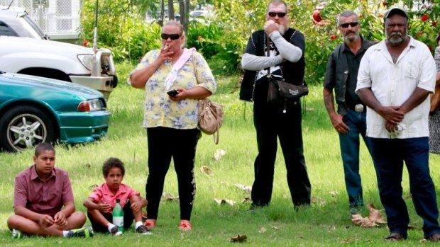 Mourners near the Cairns Convention Centre