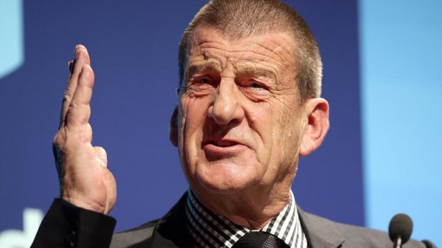 Jeff Kennett has attacked Malcolm Turnbull for engaging in domestic politics while overseas.