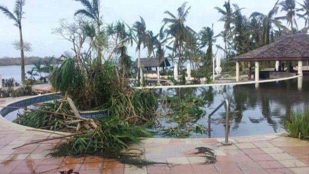 Destruction: Pools at Warwick Le Lagon resort filled with cyclone debris.