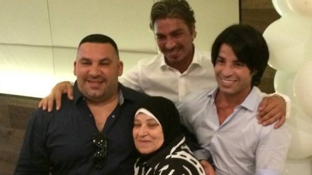 Michael Ibrahim, left, and brother Fadi, right, will face court on Monday. They are pictured with their brother John and mother.