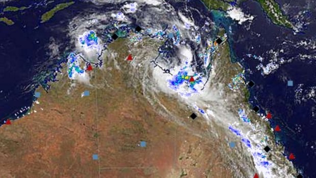 A severe system over the Northern Territory is threatening to develop into a tropical cyclone over the coming days, with north-west Queensland in its path.