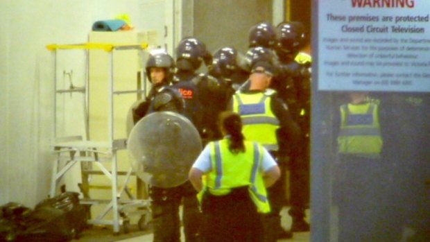 Riot police and dog handlers were called to the Parkville centre last November.
