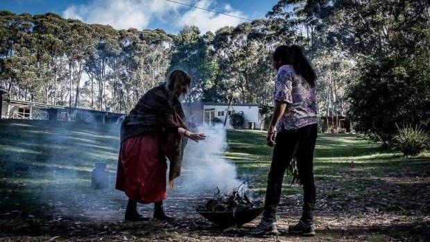 Wendy Lotter (right) at a Women Wisdom Retreat Camp smoking ceremony.