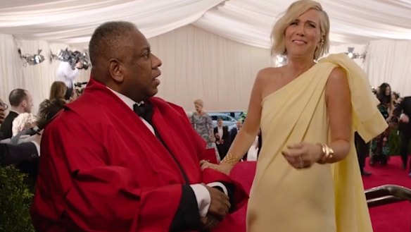 Kristen Wiig reacts to being asked if she likes Chinese food by André Leon Talley.