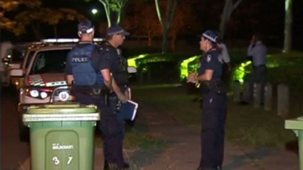 Police investigate at a Kippa-Ring house after a woman was stabbed to death on Thursday night.