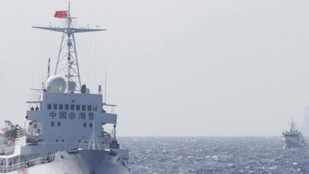 Chinese Coast Guard ships in disputed waters in the South China Sea last year.