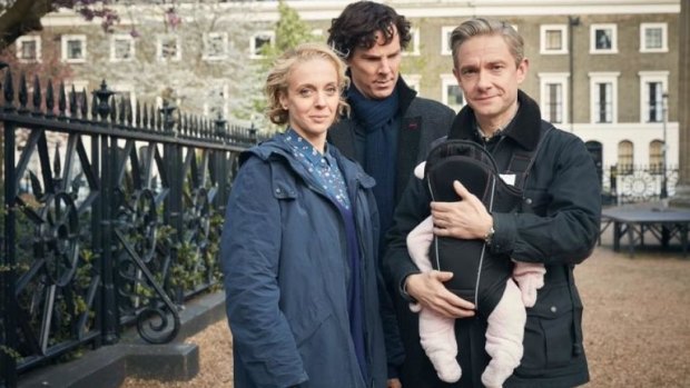 Happy families: The Watsons with their newest edition, and Sherlock looking so pleased for them.