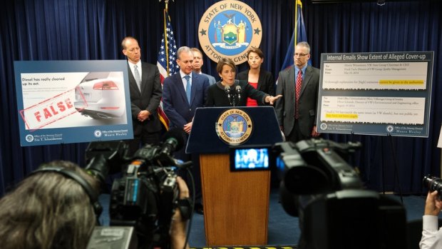 Maura Healey, the Massachusetts attorney general, centre, with Eric Schneiderman, the New York attorney general, left. They, along with Maryland'ss attorney general, filed lawsuits over Volkswagen's emissions deception. 