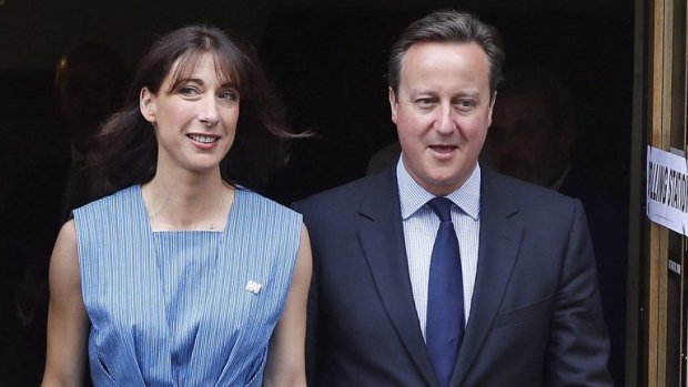 British Prime Minister David Cameron and his wife Samantha leave after voting in the EU referendum in London.