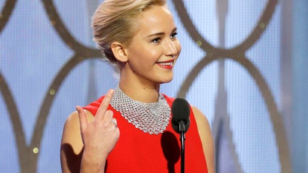 Firm friends: Jennifer Lawrence sneakily called Adele a "bitch" in her TIME profile.