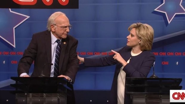 Larry David as Bernie Sanders and Kate McKinnon as Hillary Clinton on <i>Saturday Night Live</i>.