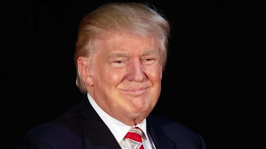 Ivanka Trump smiles at her father, Republican presidential candidate, Donald Trump.