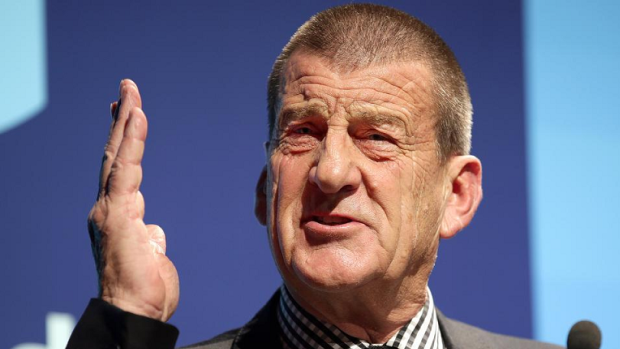 Jeff Kennett has attacked Malcolm Turnbull for engaging in domestic politics while overseas.