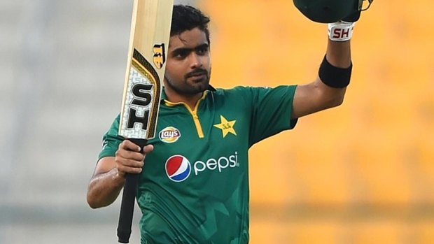 Young gun: Babar Azam raises the bat after one of his three one-day international tons. 