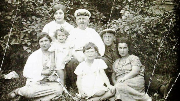 Yelena Kurchinsky (standing, front left) with her parents Vladimir and Hana (right), her sisters and her grandparents in Kiev in the northern summer of 1938.