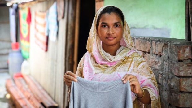 Garment worker Anju, who sews jumpers for 37¢ an hour in a factory in Bangladesh.