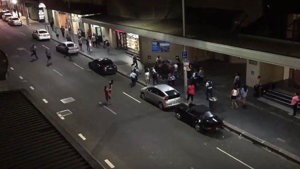 A resident filmed as the brawl broke out on the street below his apartment. 