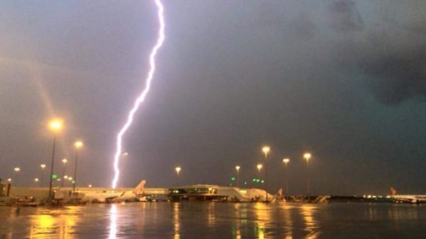 Lightning strike at Brisbane Airport during severe thunderstorm.
