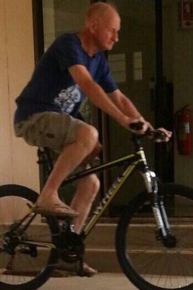A police surveillance photo of convicted child sex abuser Peter Dundas Walbran riding on a bike in Ubon Ratchatani earlier this week.