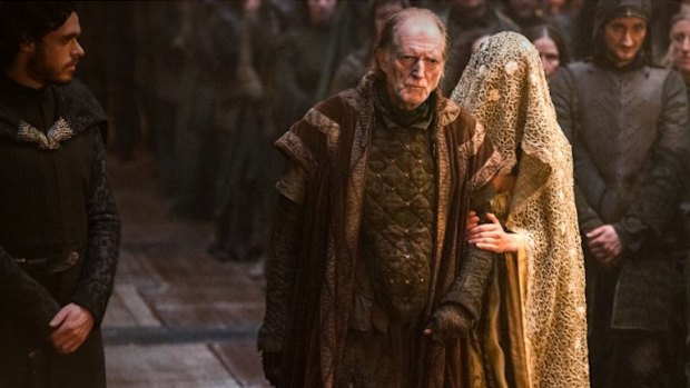 Robb Stark (left) attends the Red Wedding held by Lord Walder Frey (centre).