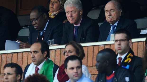 Travelled the world: Clinton with Sepp Blatter at the 2010 World Cup in South Africa.