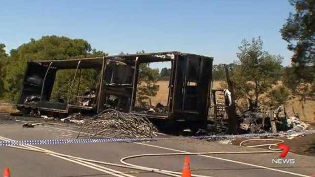 The charred hull of the semi-trailer.